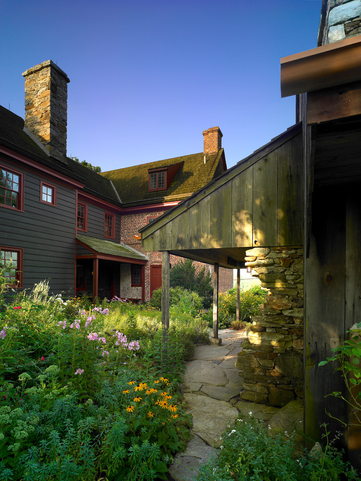 Inspiration for a country brick exterior in Philadelphia.