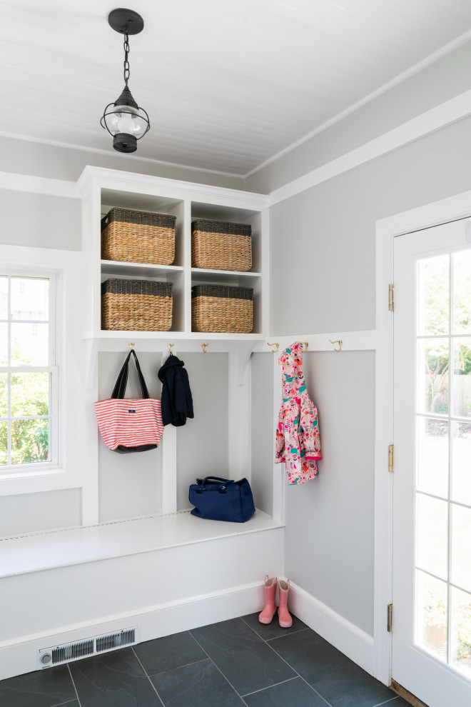 Example of a small classic slate floor and black floor mudroom design in Philadelphia with gray walls