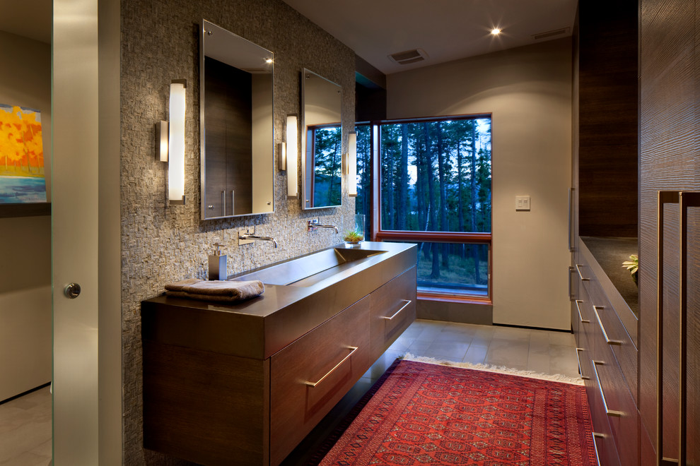 Design ideas for a large contemporary master bathroom in Other with flat-panel cabinets, dark wood cabinets, beige walls, porcelain floors, a trough sink and granite benchtops.
