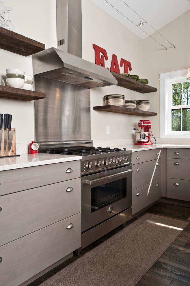 Open concept kitchen - large transitional l-shaped dark wood floor and brown floor open concept kitchen idea with a farmhouse sink, flat-panel cabinets, gray cabinets, quartz countertops, stainless steel appliances and an island