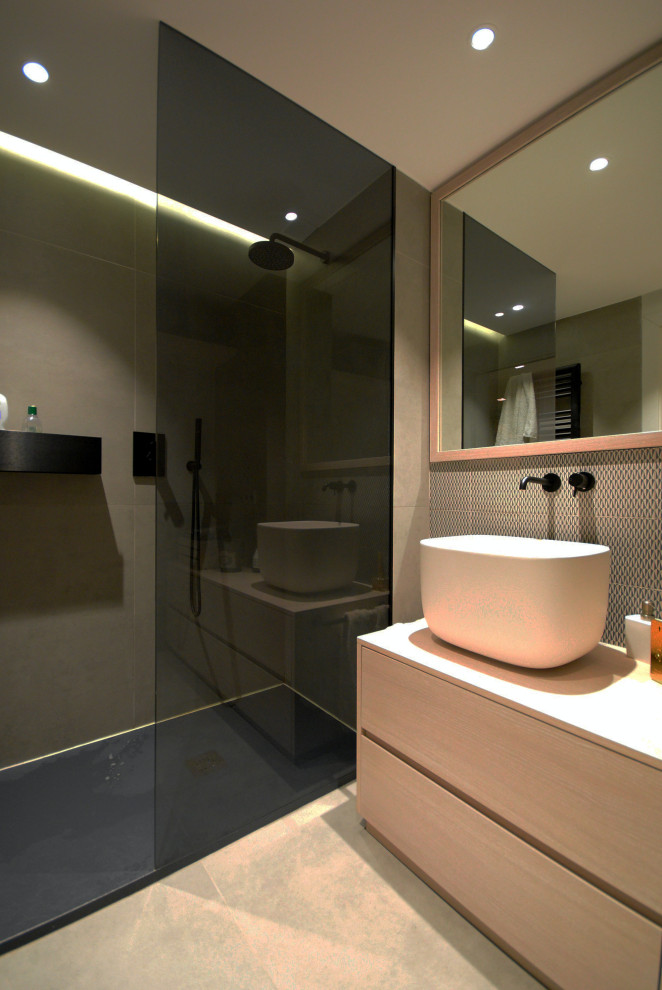Inspiration for a medium sized modern family bathroom in San Francisco with flat-panel cabinets, beige cabinets, a built-in shower, a one-piece toilet, black tiles, terracotta tiles, white walls, porcelain flooring, a vessel sink, beige floors, a sliding door, yellow worktops, a wall niche, a single sink, a floating vanity unit, a drop ceiling and wainscoting.
