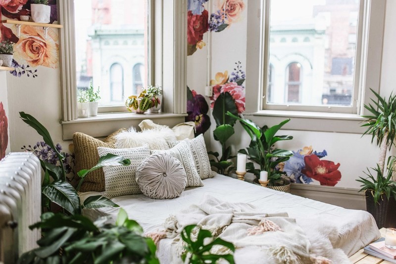 Inspiration for a large tropical nursery for girls in Vancouver with white walls.