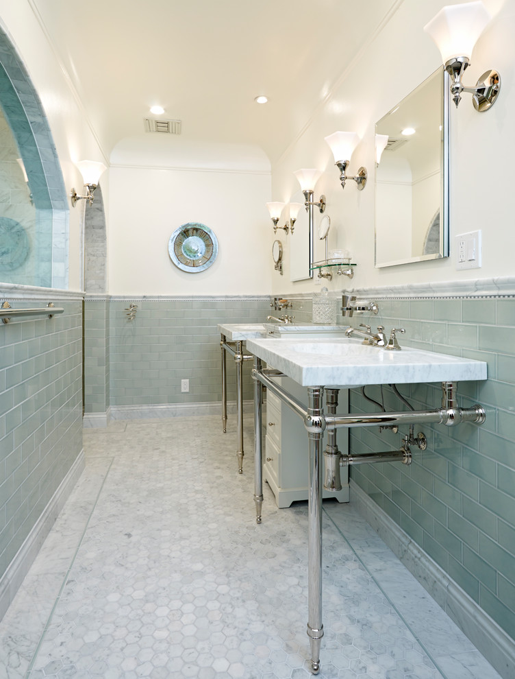 This is an example of a mid-sized transitional 3/4 bathroom in Orange County with recessed-panel cabinets, white cabinets, an alcove shower, green tile, ceramic tile, grey walls, an integrated sink, marble benchtops, grey floor, an open shower, white benchtops and marble floors.