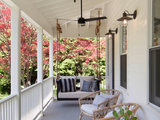 Farmhouse Porch by Garrison Foundry Architecture + Decor