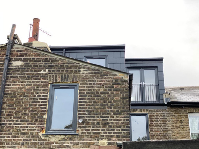 Loft conversion contemporaneo-cocina