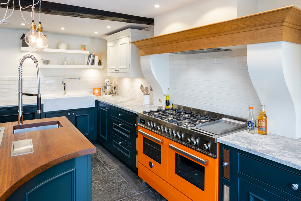 This is an example of a transitional kitchen in Dorset.