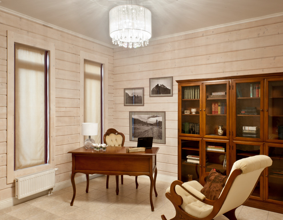 Mid-sized home office in Moscow with a library, ceramic floors, a freestanding desk and beige floor.