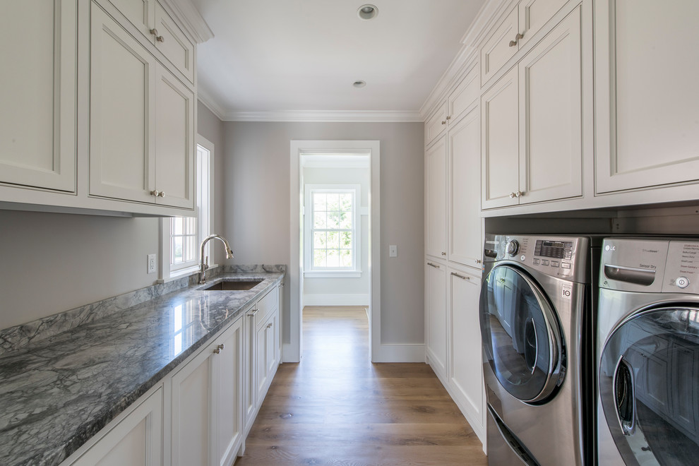 Lower Cliff Rd. - Example of a huge beach style galley dedicated laundry room design in Boston with an undermount sink, white cabinets, granite countertops, a side-by-side washer/dryer and beaded inset cabinets