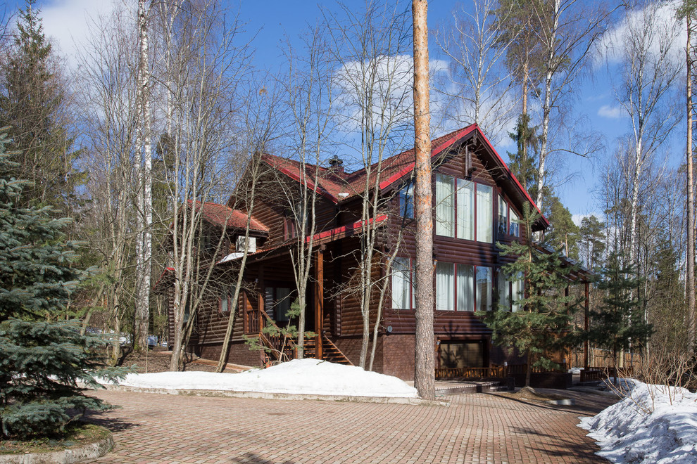 Country exterior in Moscow with wood siding.