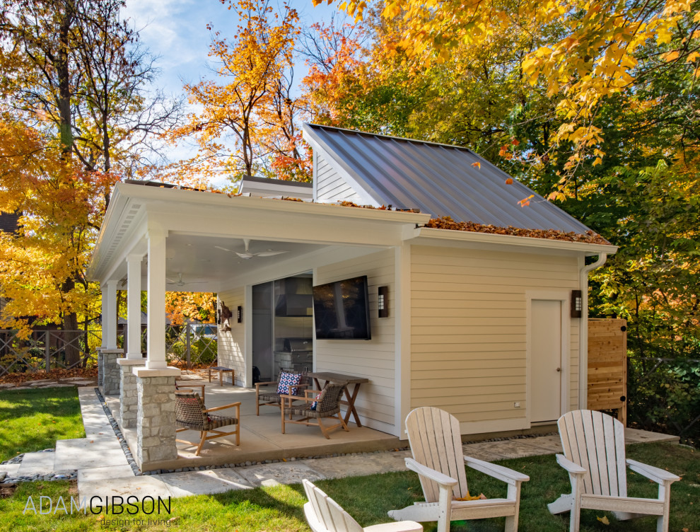 Example of a large trendy white one-story concrete fiberboard and clapboard tiny house design in Indianapolis with a shed roof, a metal roof and a gray roof