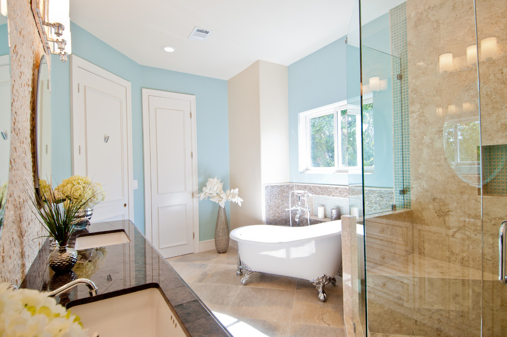 Large contemporary master bathroom in San Diego with a claw-foot tub, blue walls, an undermount sink, white cabinets, a corner shower, raised-panel cabinets, a two-piece toilet, beige tile, stone tile, travertine floors, marble benchtops and a hinged shower door.