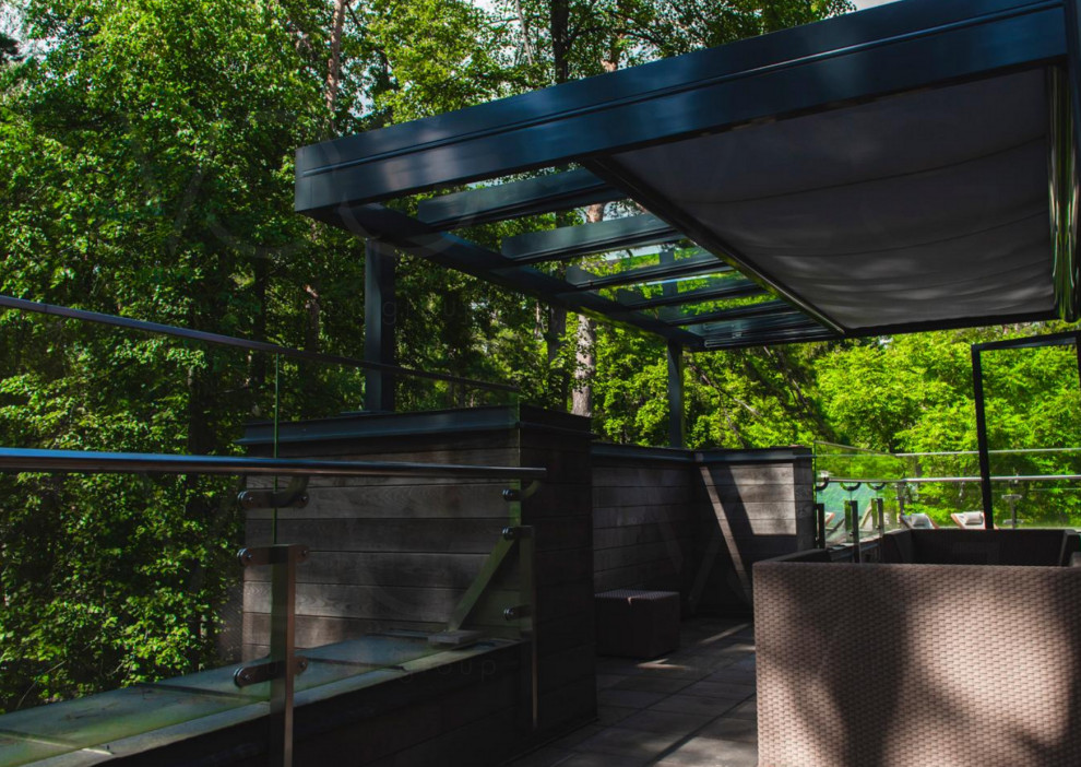 Стеклянная веранда на эксплуатируемой кровле