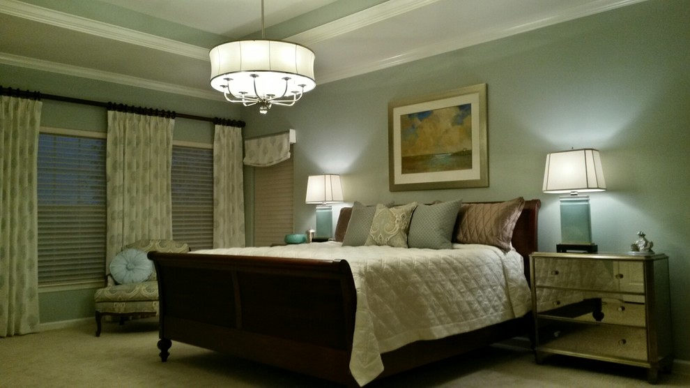 Design ideas for a large eclectic master bedroom in Cincinnati with green walls and carpet.