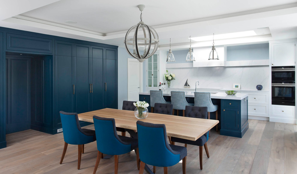 Example of a transitional kitchen design in Dublin