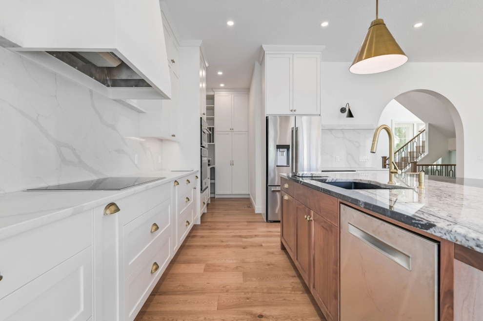 Example of a minimalist kitchen design in Calgary