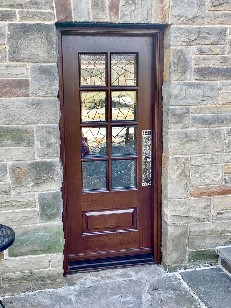 Mountain style entryway photo in Toronto