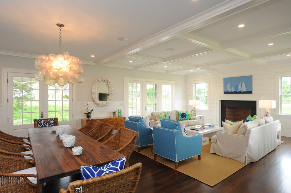 Inspiration for a beach style formal open concept living room in Boston with white walls, dark hardwood floors, a standard fireplace and no tv.