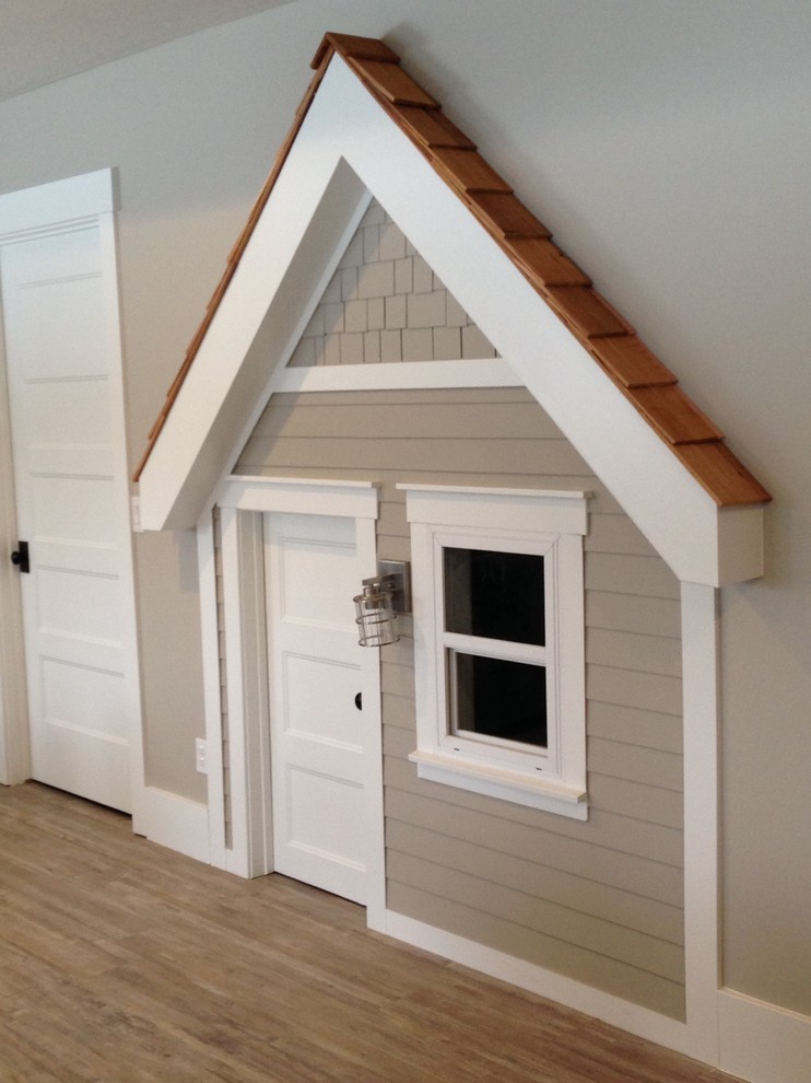 Example of a small classic gender-neutral light wood floor playroom design in Salt Lake City with gray walls