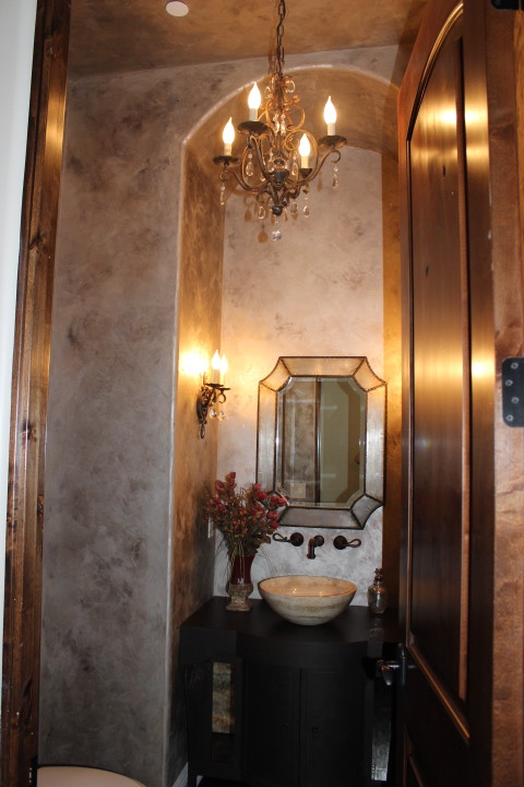 Bathroom - mid-sized transitional 3/4 travertine floor bathroom idea in Phoenix with a vessel sink, furniture-like cabinets, dark wood cabinets and beige walls