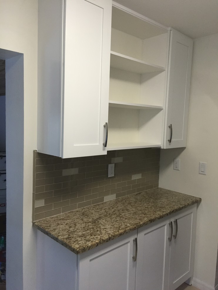 Example of a transitional kitchen design in Miami