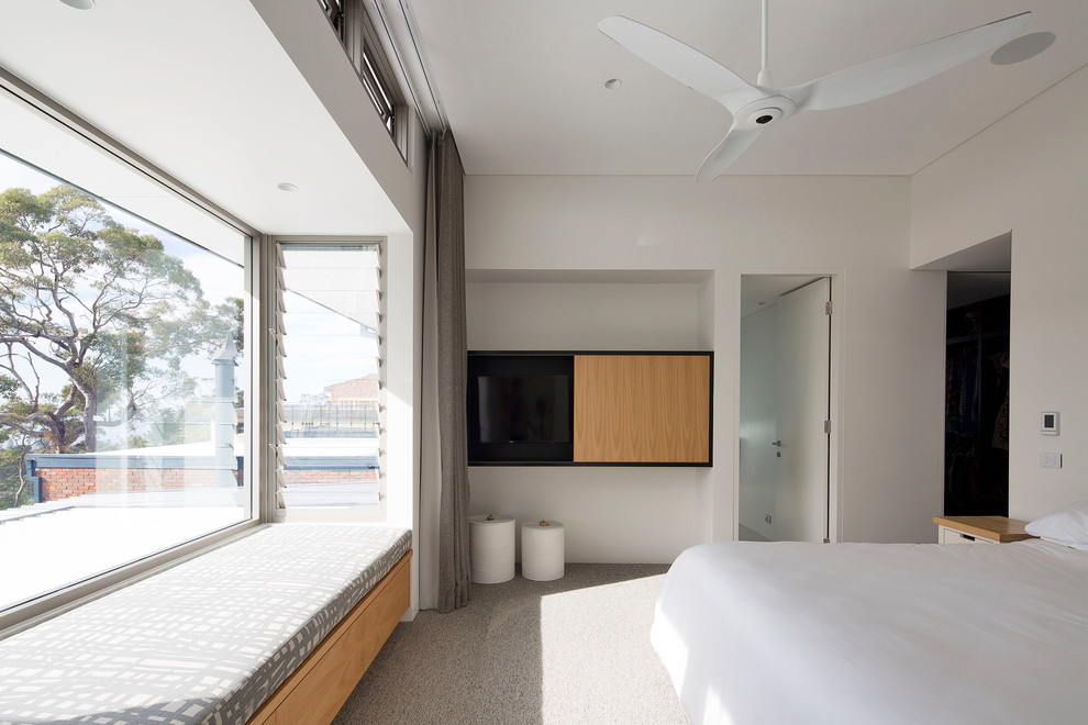 Design ideas for a modern master bedroom in Sydney.