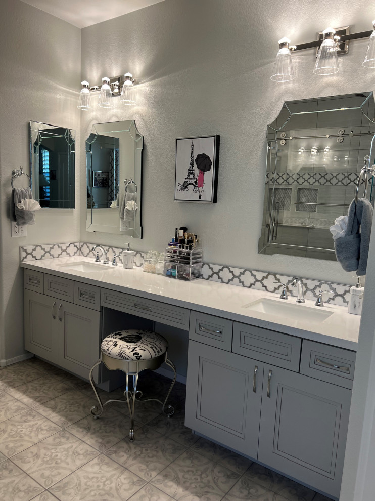 Large vintage ensuite bathroom in Phoenix with grey cabinets, an alcove bath, a corner shower, porcelain tiles, a submerged sink, engineered stone worktops, a sliding door, white worktops and a built in vanity unit.