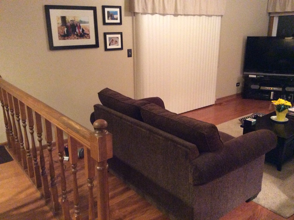 What to do with railing and step down into family room..