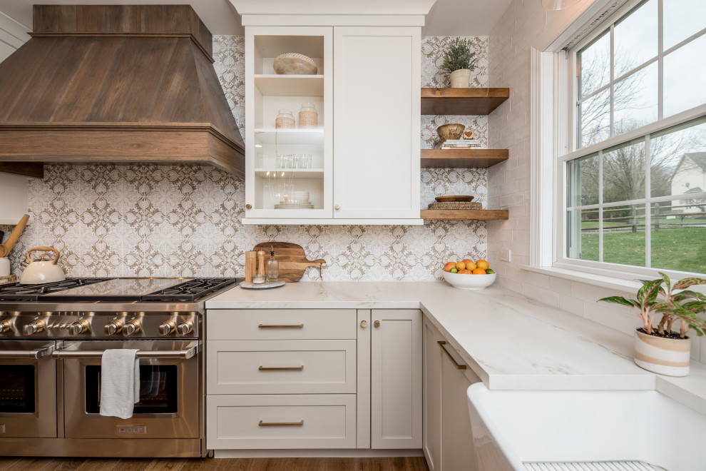 This is an example of a country kitchen in Philadelphia with multiple islands.