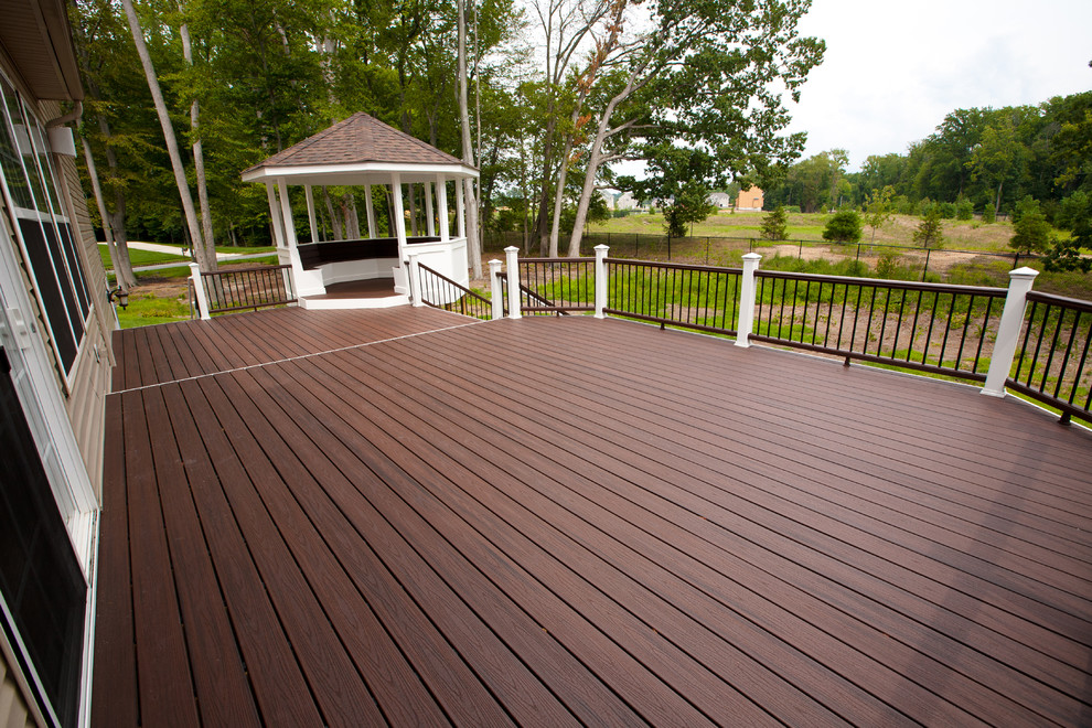 Design ideas for a large arts and crafts backyard verandah in Philadelphia with decking and a roof extension.
