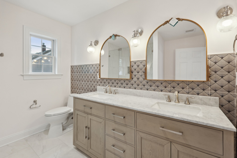 Primary Bath with Fan Tile and Arched Mirrors