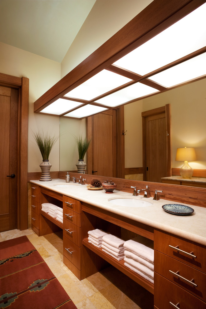 This is an example of a contemporary bathroom in Los Angeles with flat-panel cabinets and medium wood cabinets.