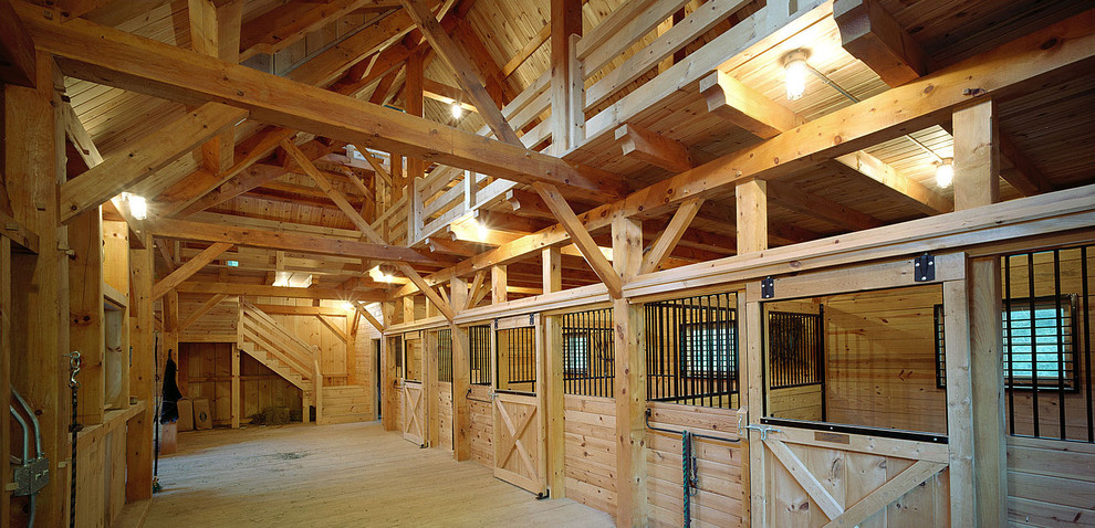 Photo of a large traditional detached barn in Boston.