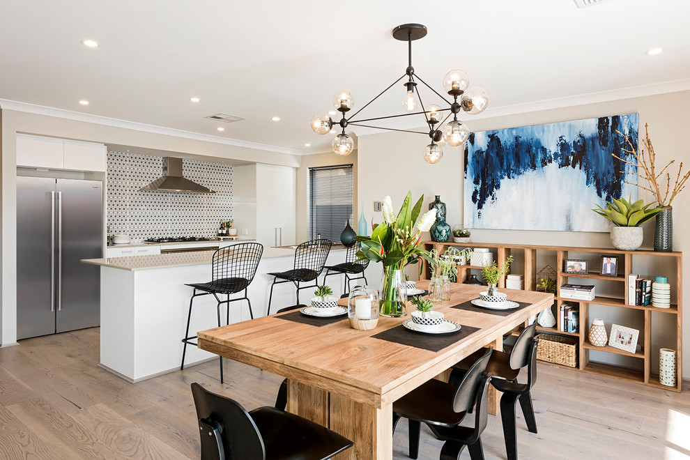 Inspiration for a mid-sized contemporary u-shaped eat-in kitchen in Perth with no island, a double-bowl sink, flat-panel cabinets, white cabinets, quartz benchtops, multi-coloured splashback, ceramic splashback, stainless steel appliances and light hardwood floors.