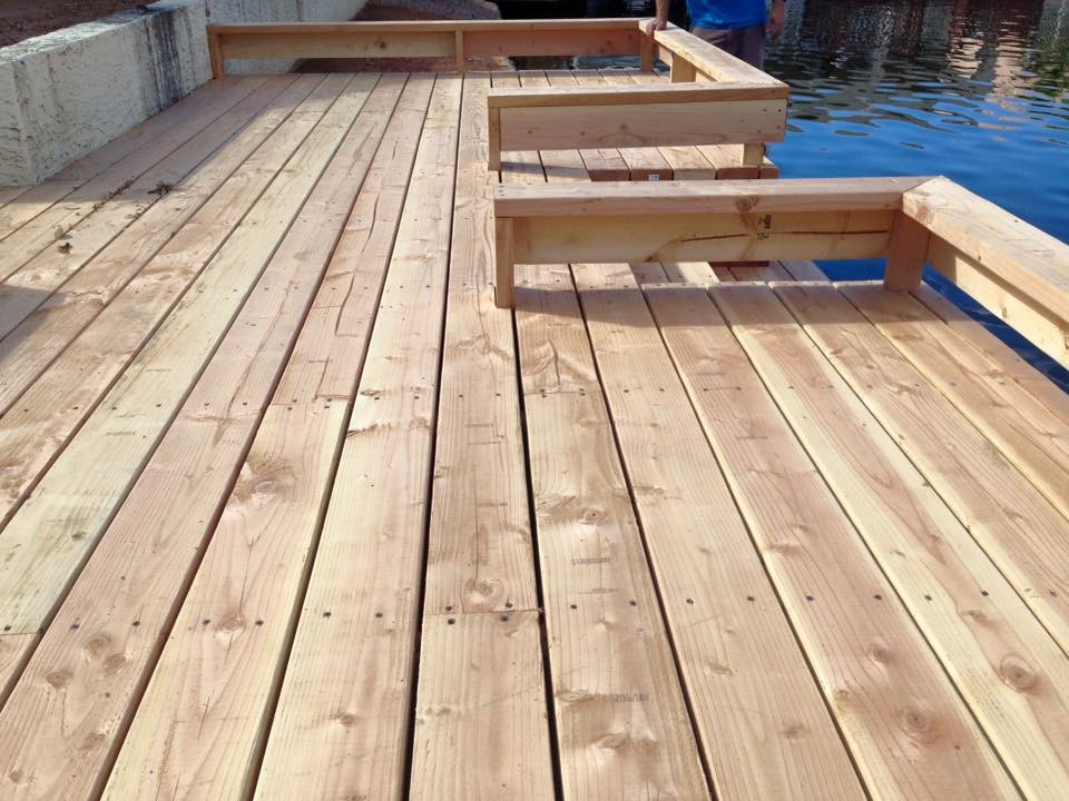 Example of a mid-sized backyard dock design in Phoenix with no cover