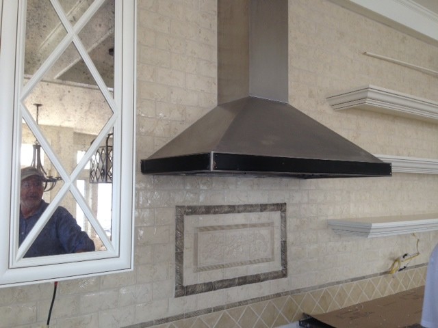 Example of a transitional kitchen design in Seattle