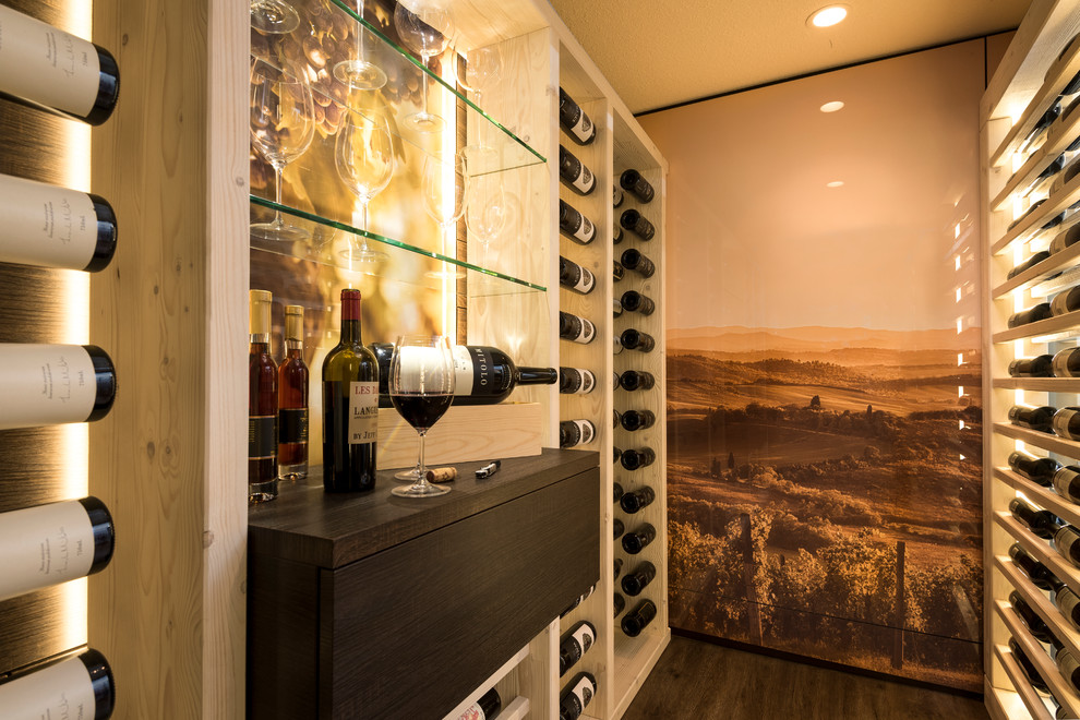 Photo of a wine cellar in Calgary with display racks.