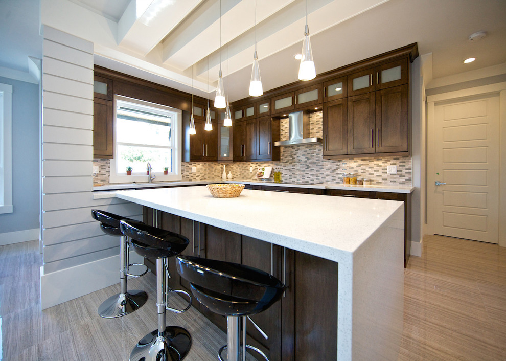 Design ideas for a contemporary open plan kitchen in Vancouver with an undermount sink, shaker cabinets, dark wood cabinets, quartzite benchtops, grey splashback, stainless steel appliances, ceramic floors and with island.