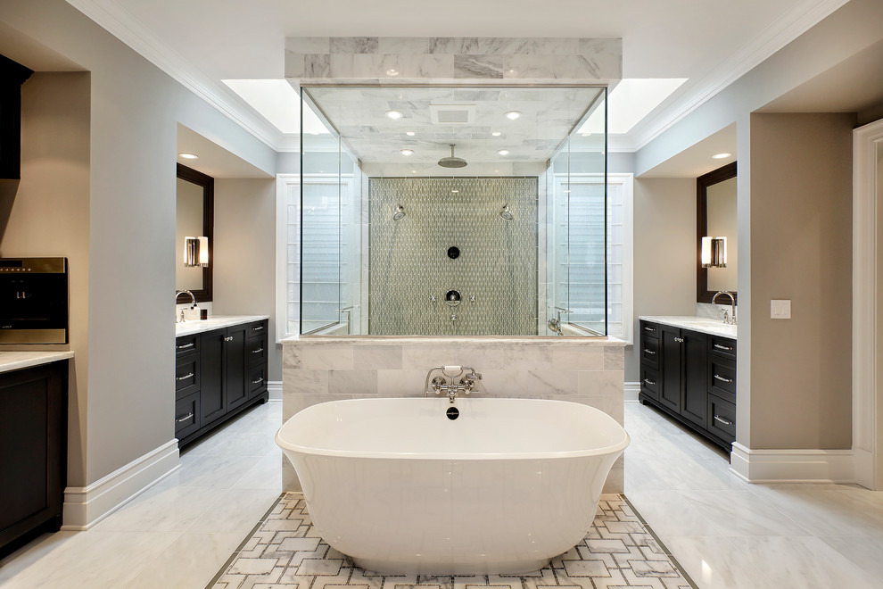 Transitional master gray tile freestanding bathtub photo in Chicago with shaker cabinets, black cabinets, gray walls and a hinged shower door