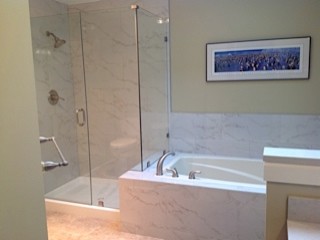 Inspiration for a transitional white tile and porcelain tile home design remodel in Seattle