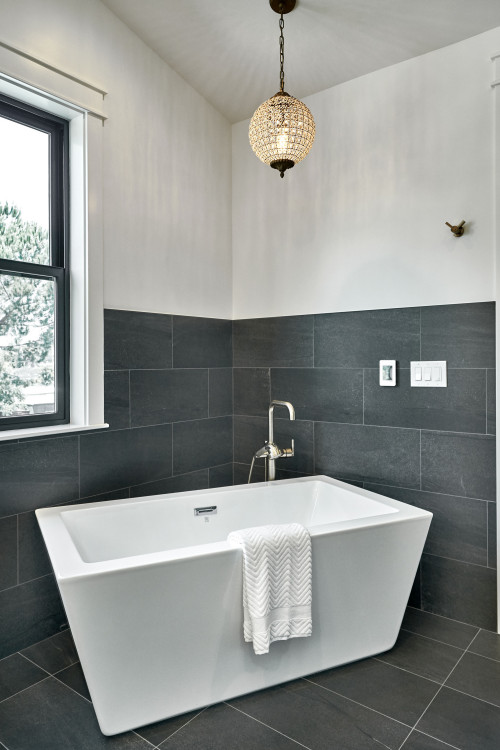 Modern Relaxation: White Freestanding Bathtub with Gray Tiles in Your Gray White Bathroom