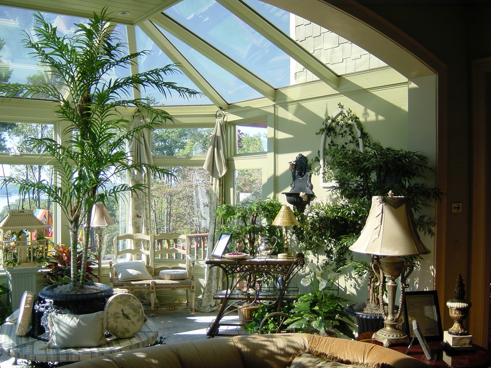 Inspiration for a mid-sized traditional sunroom in Atlanta with porcelain floors, no fireplace and a skylight.