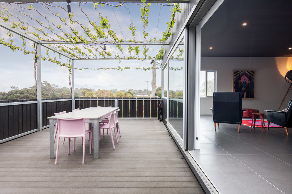 Contemporary deck in Adelaide with a pergola.