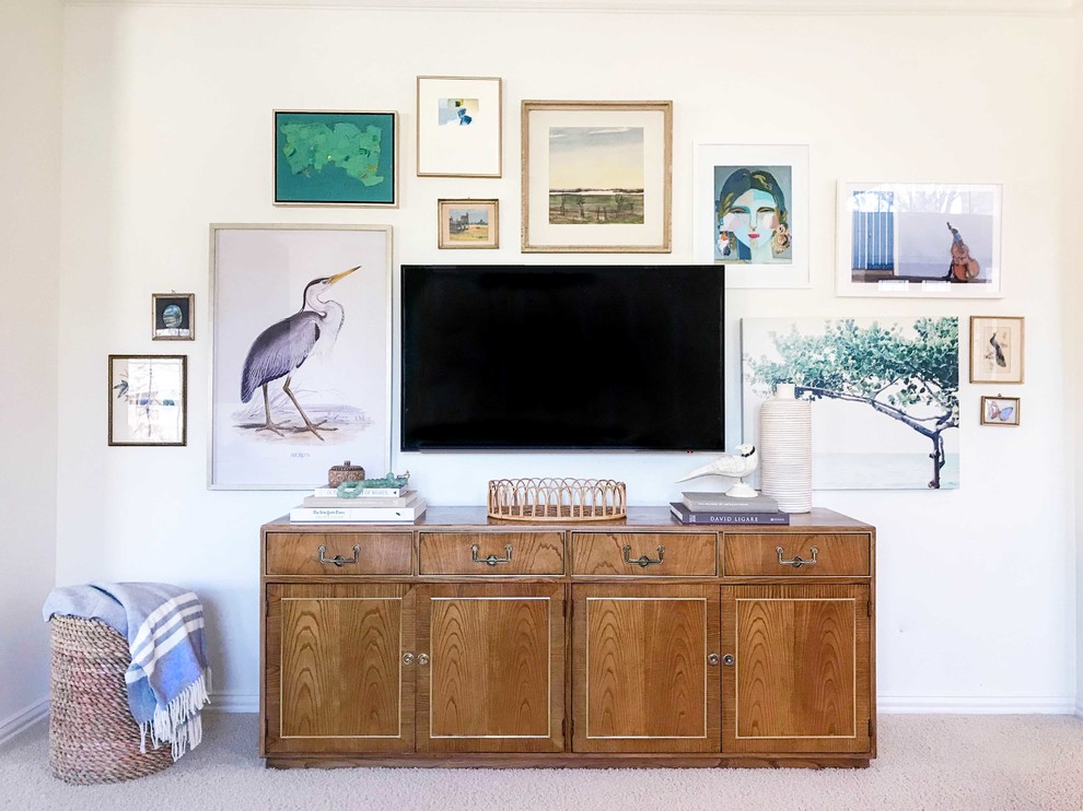 Living Room Gallery Wall Dallas – Styled Media Console & Artwork | Lark Interior - Living room design in a Dallas home featuring a curated gallery wall around a media console, layered artwork, and warm wood tones, creating a personalized space with visual interest and balance.
