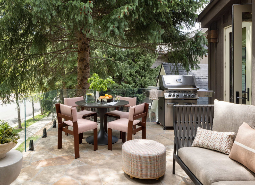 Inspiration for a mid-sized modern front yard patio in Denver with an outdoor kitchen and no cover.
