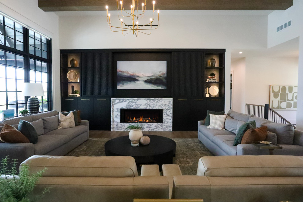 Example of a huge transitional formal and open concept light wood floor living room design in Other with white walls, a standard fireplace, a stone fireplace and a media wall