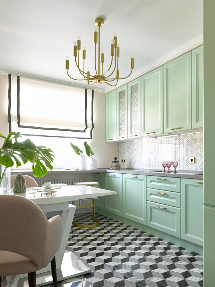 Design ideas for a transitional separate kitchen in Moscow with recessed-panel cabinets, green cabinets, grey splashback, no island, grey floor and grey benchtop.