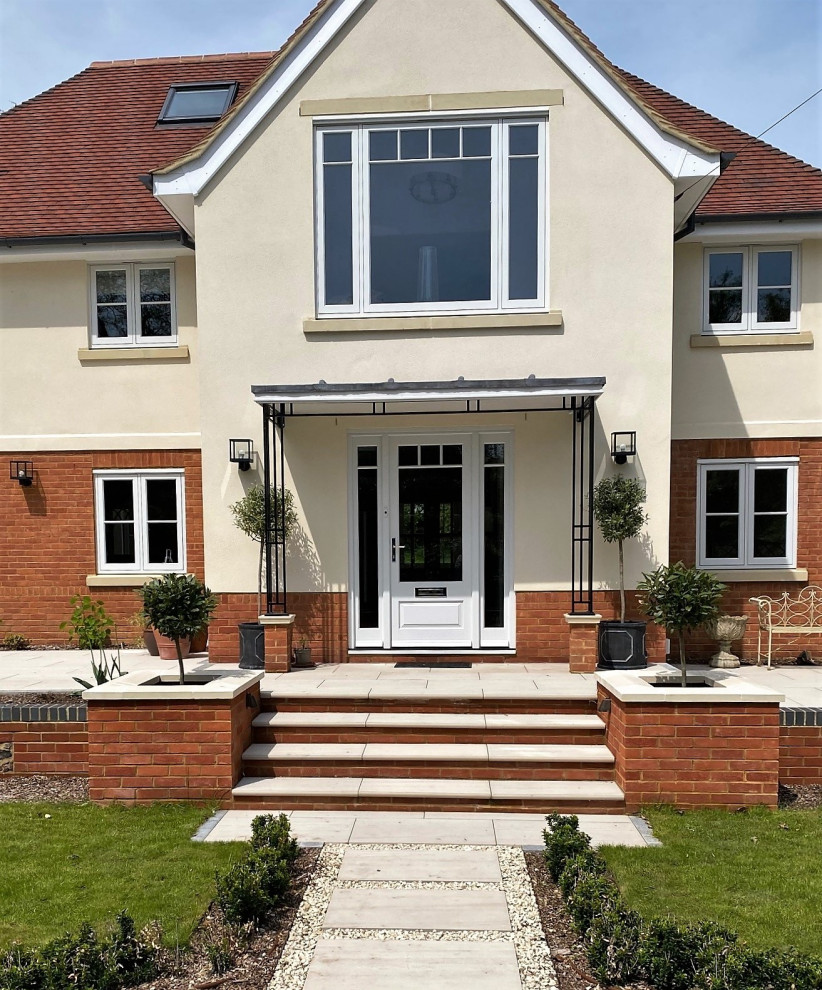 Inspiration for a medium sized modern porch in Berkshire with a single front door and a white front door.