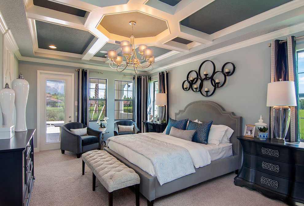 This is an example of an expansive transitional master bedroom in Orlando with grey walls, carpet, no fireplace, grey floor and recessed.
