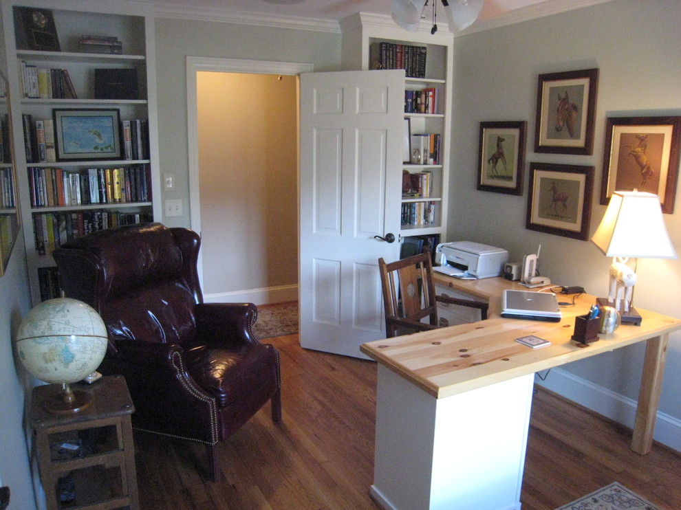Mid-sized traditional home office in Other with blue walls, medium hardwood floors and a freestanding desk.