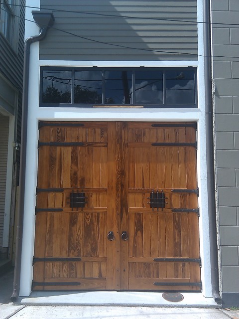 New Orleans Historic Carriage House Doors With Dark Bronze